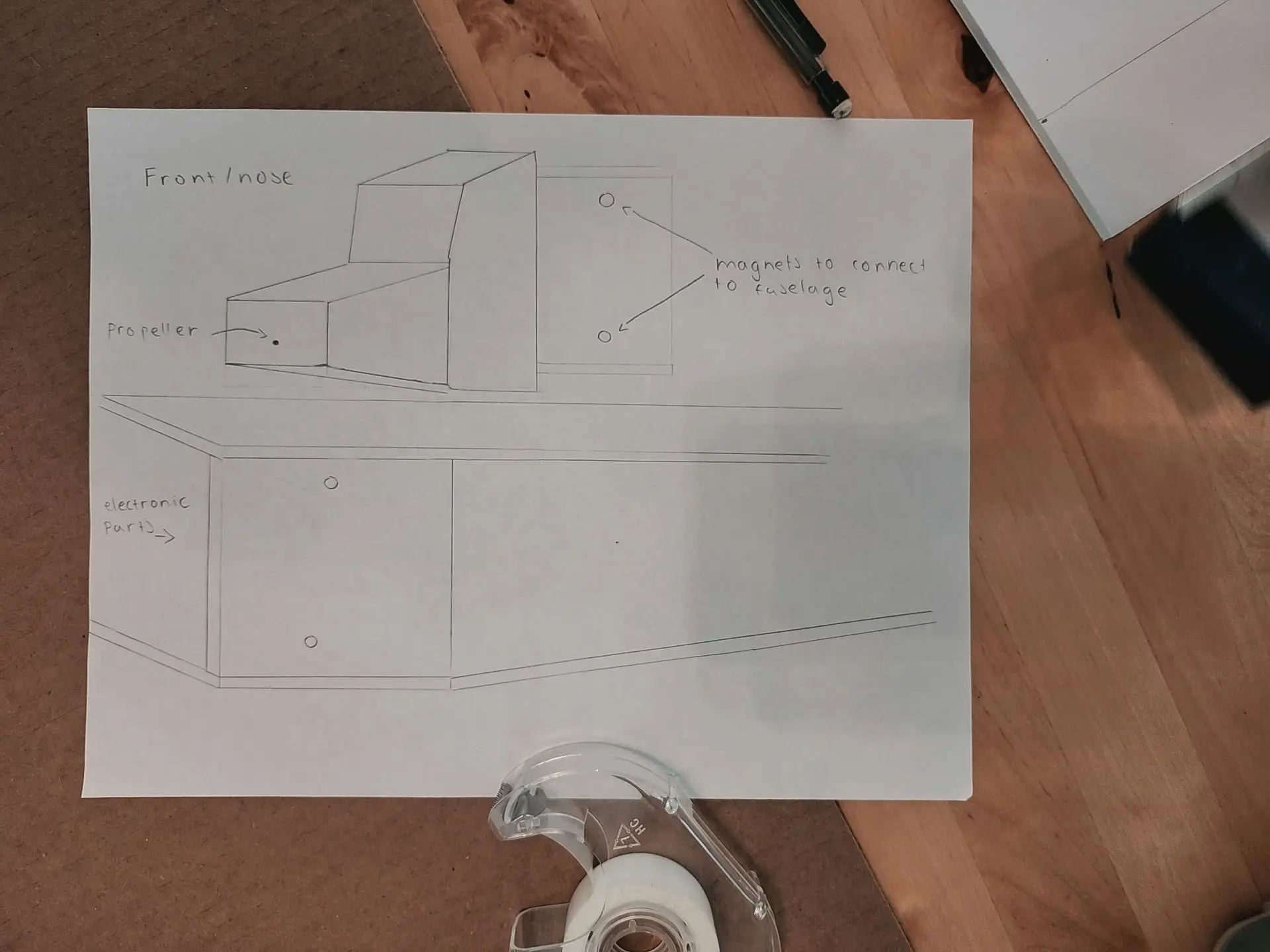 Hand sketch showing the aircraft fuselage geometry and internal component positions.