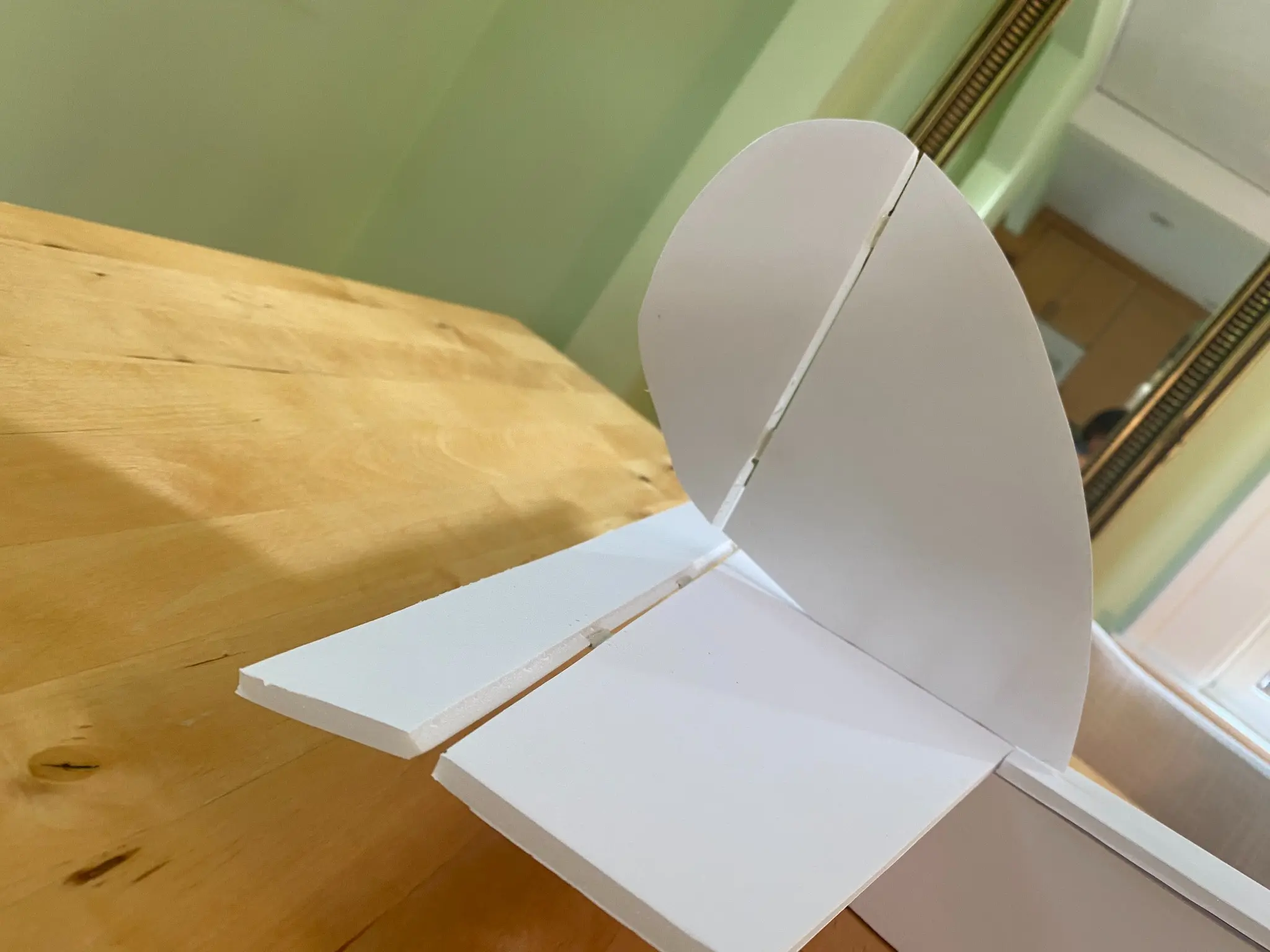 Foam-board elevator and rudder at the rear of the aircraft.