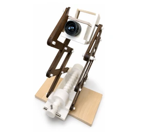 The fabricated lamp with wooden linkages and a mounted flashlight.