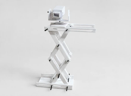 Foamboard-and-straw lamp mechanism prototype.